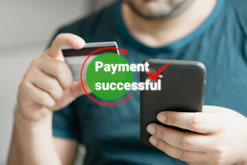 Man using smartphone and holding credit card with payment online successful screen, banking and shopping online. Transferring money online using applications
