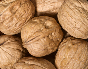 Whole walnuts as background