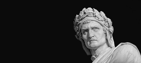 Fototapeta na wymiar Dante Alighieri the greatest italian poet. Marble statue erected in Florence Santa Croce square in 1865 (Black and White with copy space)