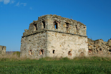 Fototapeta na wymiar Stone tower in Pniv Castle - medieval historical object in western Ukraine