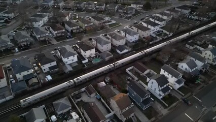 Aerial view of the railroad surrounded by buildings in Long Island, NY