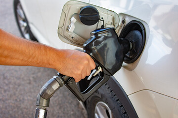 The driver refuels the car