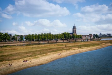 Beautiful view of a beach and city in the background in Deventer, Netherlands