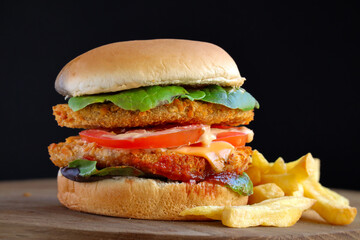 Double chicken hamburger with fries