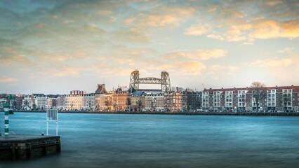 Fototapeta premium Scenic view of the De Hef landmark visible on the horizon located in Rotterdam, Netherlands