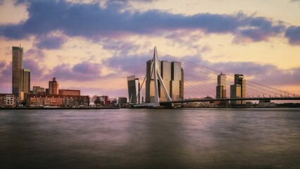 Scenic view of the city of Rotterdam and the Erasmusbrug bridge seen during the sunset