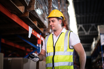 Caucasian male warehouse worker scanning package with barcode scanner to count inventory balance in online system in storage warehouse.