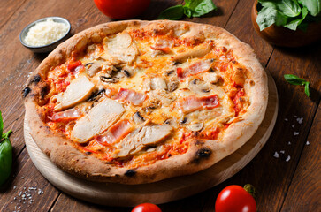 Obraz na płótnie Canvas Chicken, Bacon, Mushroom Pizza on Wooden Background, Stone Baked Pizza