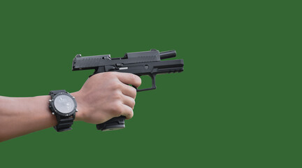 Isolated automatic 9mm pistol gun  holding in hand of shooter with clipping paths.