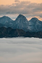 Fototapeta na wymiar Mountains covered by fog during the sunset in South Tyrol