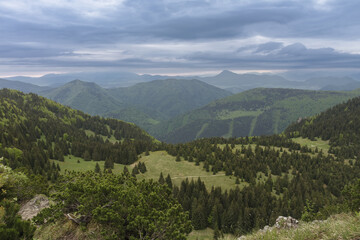 View from Maly Rozsutec to mountain pass Medzirozsutce , Mala Fatra, Slovakia in spring cloudy morning
