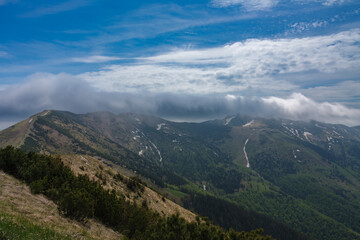 Fototapeta na wymiar Mountains Hromove, Chleb, Velky Krivan, national park Mala Fatra, Slovakia, spring cloudy day.
