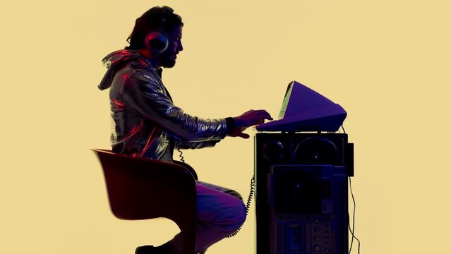 Young man working on a vintage compute