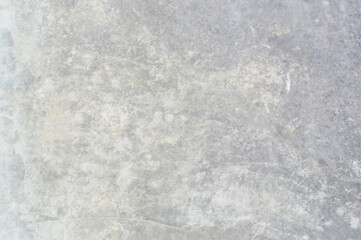 Old dirty grey concrete background texture used in decorative art work. Gray concrete wall texture with strange pattern and stripes