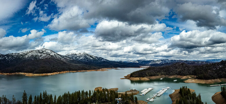 Lake surrounded by snowy mountains