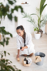 House keeping concept. Woman wiping floor. Woman doing chores at home.