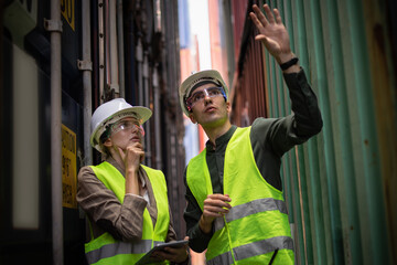 Engineer or Foreman using reality glasses simulation working with hologram control or check...