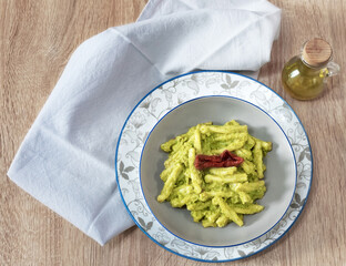a plate of broccoli pasta