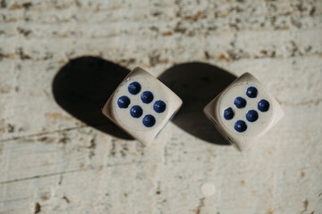 dice on a wooden table