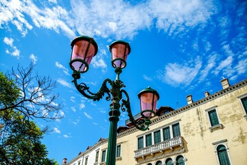 Fototapeta na wymiar Low-angle shot of the street light against a blue sky
