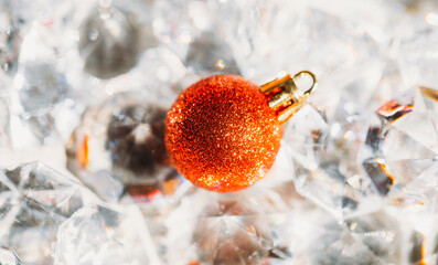 red christmas ball on snow