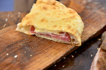 Home made focaccia bread with cheese and game ham sandwich.
