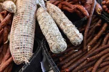 Various home made game meat specialties prepared and smoked, presented at a hunting fair.