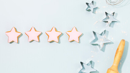 Cooking holiday cookies. Bakery kid flat lay. Ginger cookies in the form of stars, covered with...