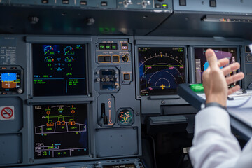 pilot in command setting control panel in cockpit