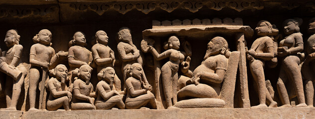 Ancient sculptures in Khajuraho temple, India. Panorama
