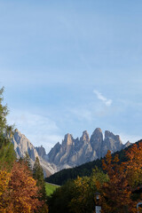 The Dolomites Mountains in Autumn; Famous Santa Maddalena Village, Val di Funes valley, Trentino Alto Adige region, Italy; Beautiful View of the Dolomites Mountains in the Background