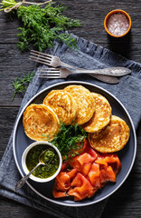 pancakes with sliced cold smoked salmon, top view