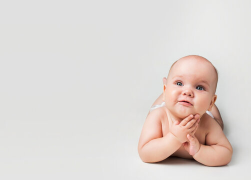 Cute baby empty copy space background. Caucasian infant advertisement space.Adorable child healthcare concept. Kid in diaper.