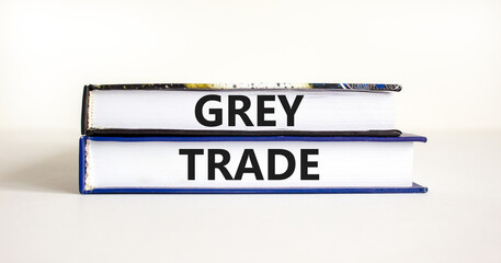 Grey trade symbol. Concept words Grey trade on books. Beautiful white table white background. Business grey trade concept. Copy space.