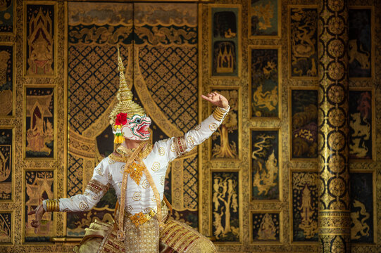 Khon Hanuman is traditional dance drama art of Thai classical monkey masked from the Ramayana with a backdrop of Thai paintings in a public place at Wat Phra Khao, Ayutthaya province, Thailand