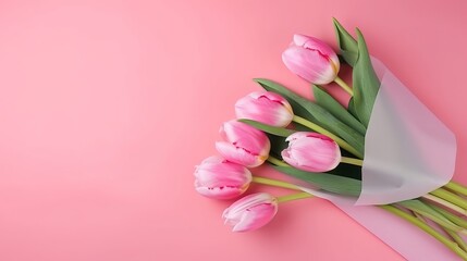 Top view of tulip bouquet wrapped in paper swirl on pink background Generative AI