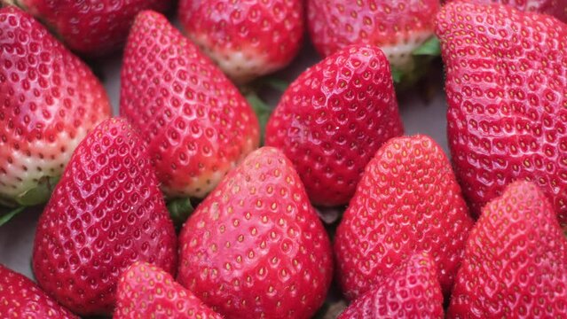 image of fresh strawberries just picked closeup organic healthy food vitamins healthy lifestyle bright red color