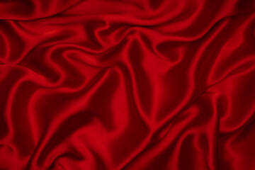 Red silk or satin luxury fabric texture can use as abstract background.