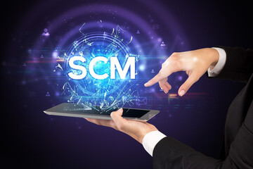 Close-up of a touchscreen with abbreviation.