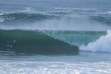 Perfect wave breaking in a beach. Surf spot	