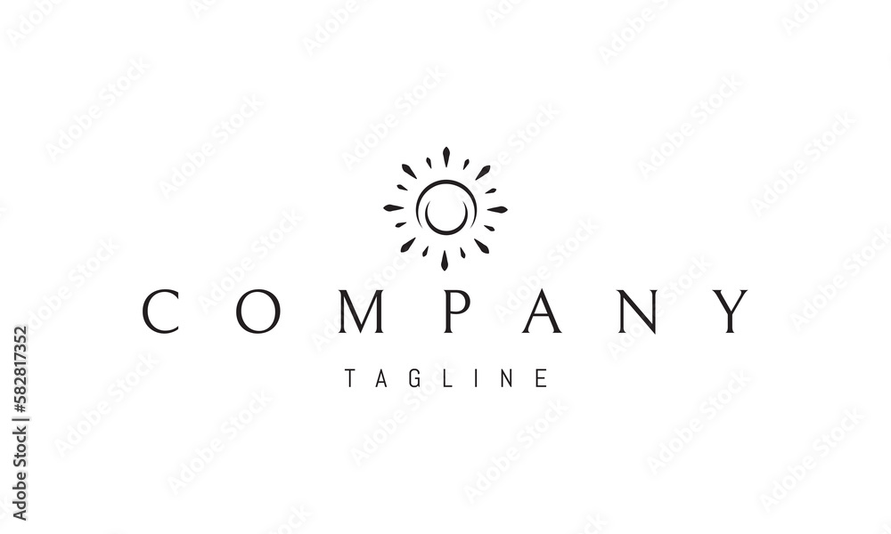 Wall mural vector logo on which an abstract image of the sun with rays and the moon inside.