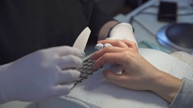 Woman gets professional cosmetic treatment in beauty salon