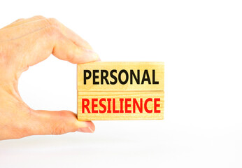 Personal resilience symbol. Concept word Personal resilience on wooden blocks. Beautiful white table white background. Businessman hand. Business psychological personal resilience concept. Copy space.