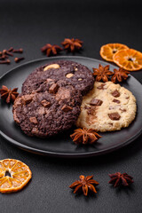 Delicious fresh crispy oatmeal cookies with chocolate and nuts