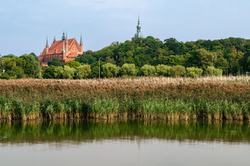 View from the Vistula lagoon at the Castle and Cathedral in Frombork, Poland. Nicolaus Copernicus lived and worked here.