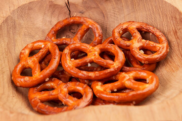 Crunchy german pretzel cookies with salt crystals close up