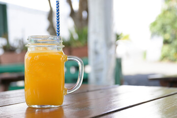 Horizontal shot of a jar of homemade orange juice