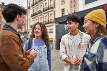 A circle of friends from diverse backgrounds, chatting and bonding while enjoying their vacation in Madrid.