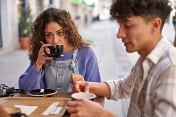 Friends from different cultures enjoy coffee and tea together.