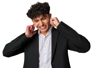 A young latin business man in suit covering ears with hands.